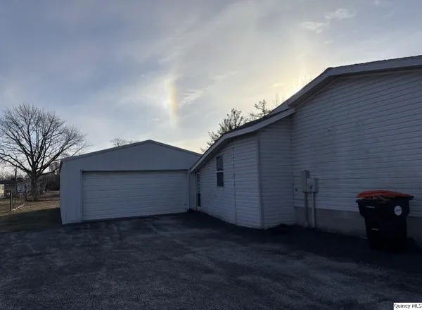 a view of a back yard of the house