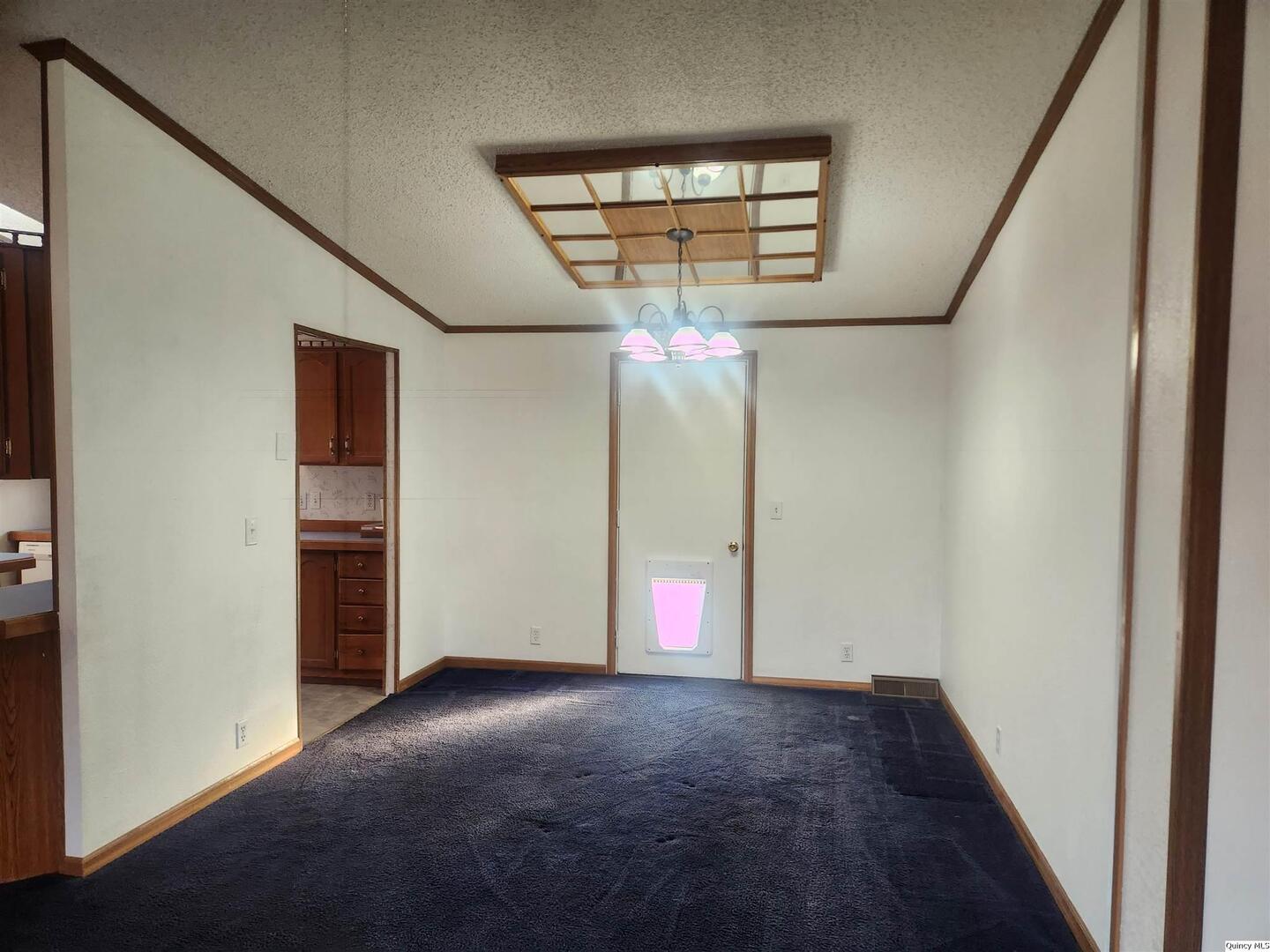 228 North Madison Street Carthage, IL 62321 - Photo 7 of 19 a view of entryway with stairs