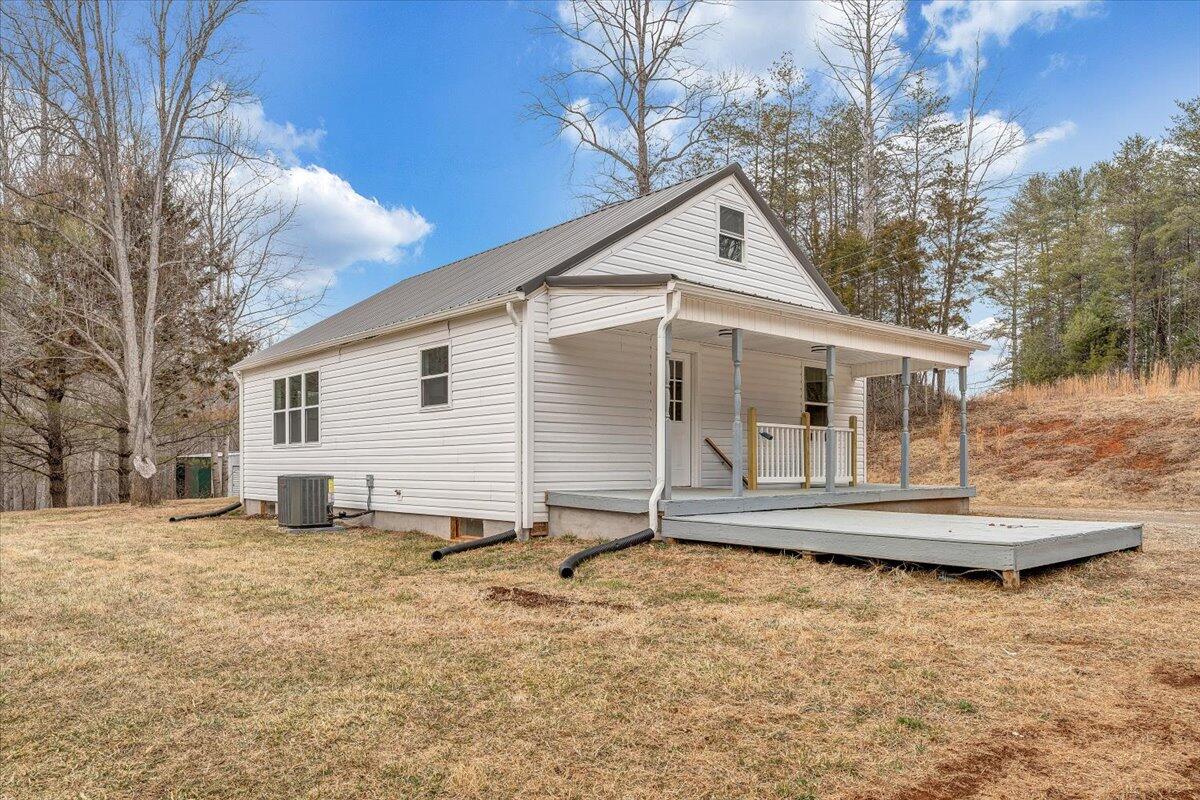 4160 Prillaman Switch Road Ferrum, VA 24088 - Photo 27 of 41 a view of a house with a yard