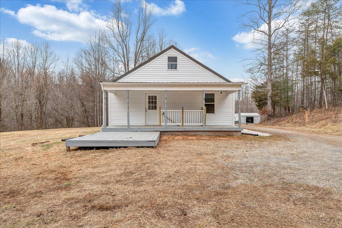 4160 Prillaman Switch Road Ferrum, VA 24088 - Photo 29 of 41 a view of a house with a yard covered in snow
