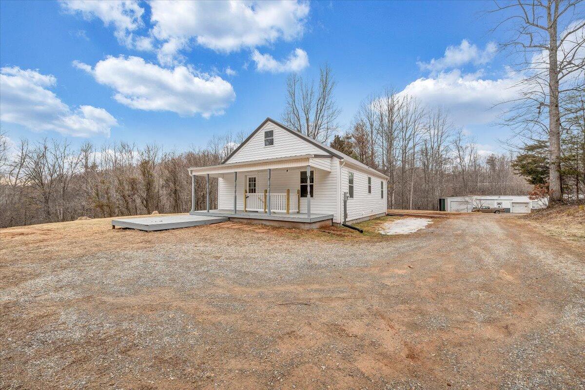 4160 Prillaman Switch Road Ferrum, VA 24088 - Photo 32 of 41 a view of house with yard and sitting area