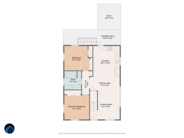 a picture of a bathroom with a white wall