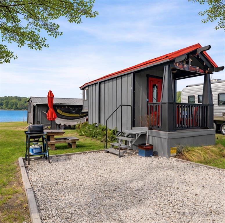2013 Bedford Court Weatherford, TX 76087 - Photo 15 of 40 a view of a house with backyard swimming pool and sitting area