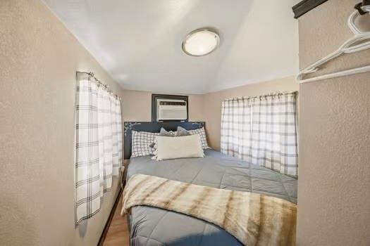 2013 Bedford Court Weatherford, TX 76087 - Photo 20 of 40 a bed room with a bed and a lamp