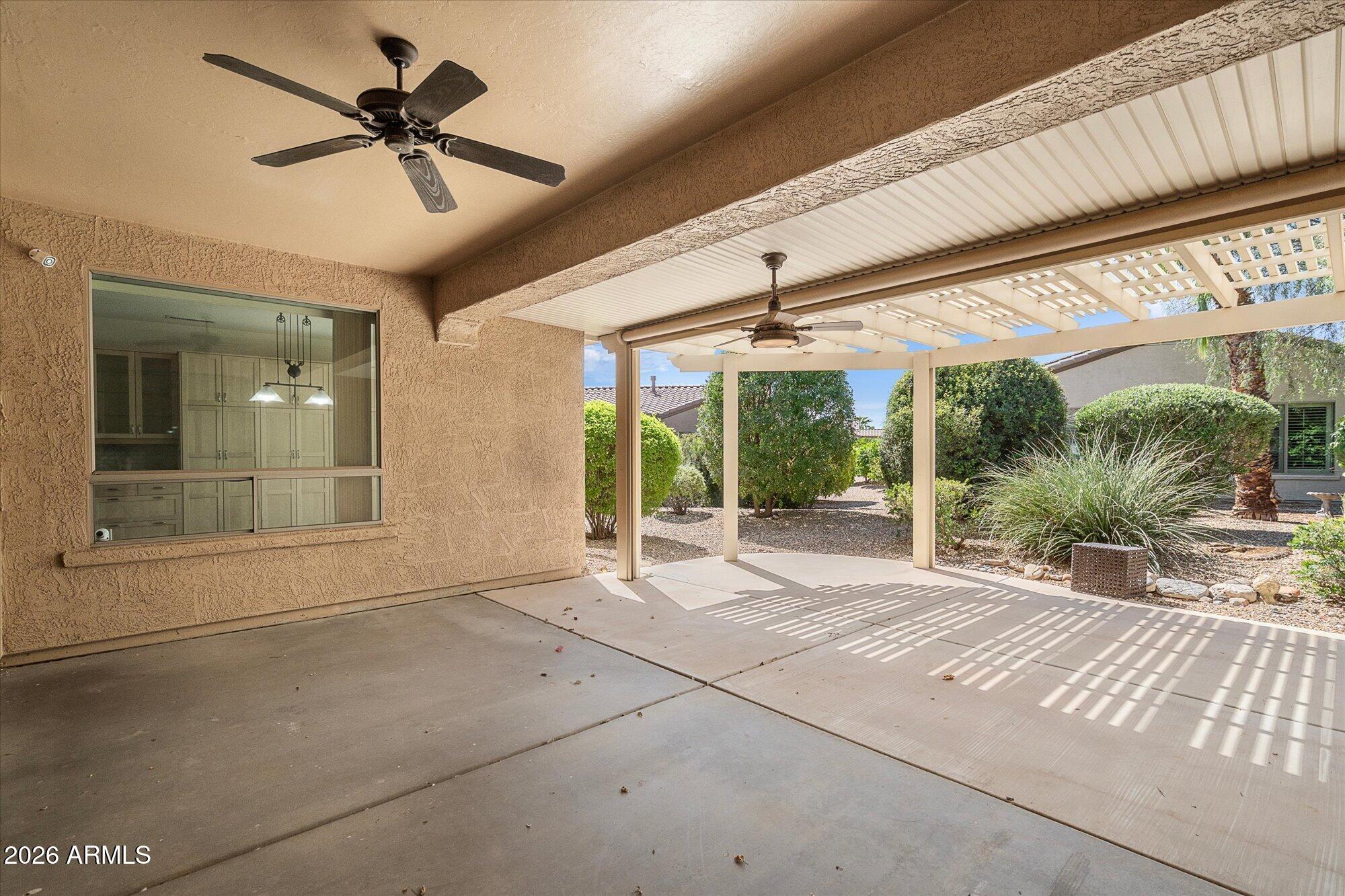 16731 West Oracle Rim Drive Surprise, AZ 85387 - Photo 23 of 30 Covered Patio with Ceiling Fans
