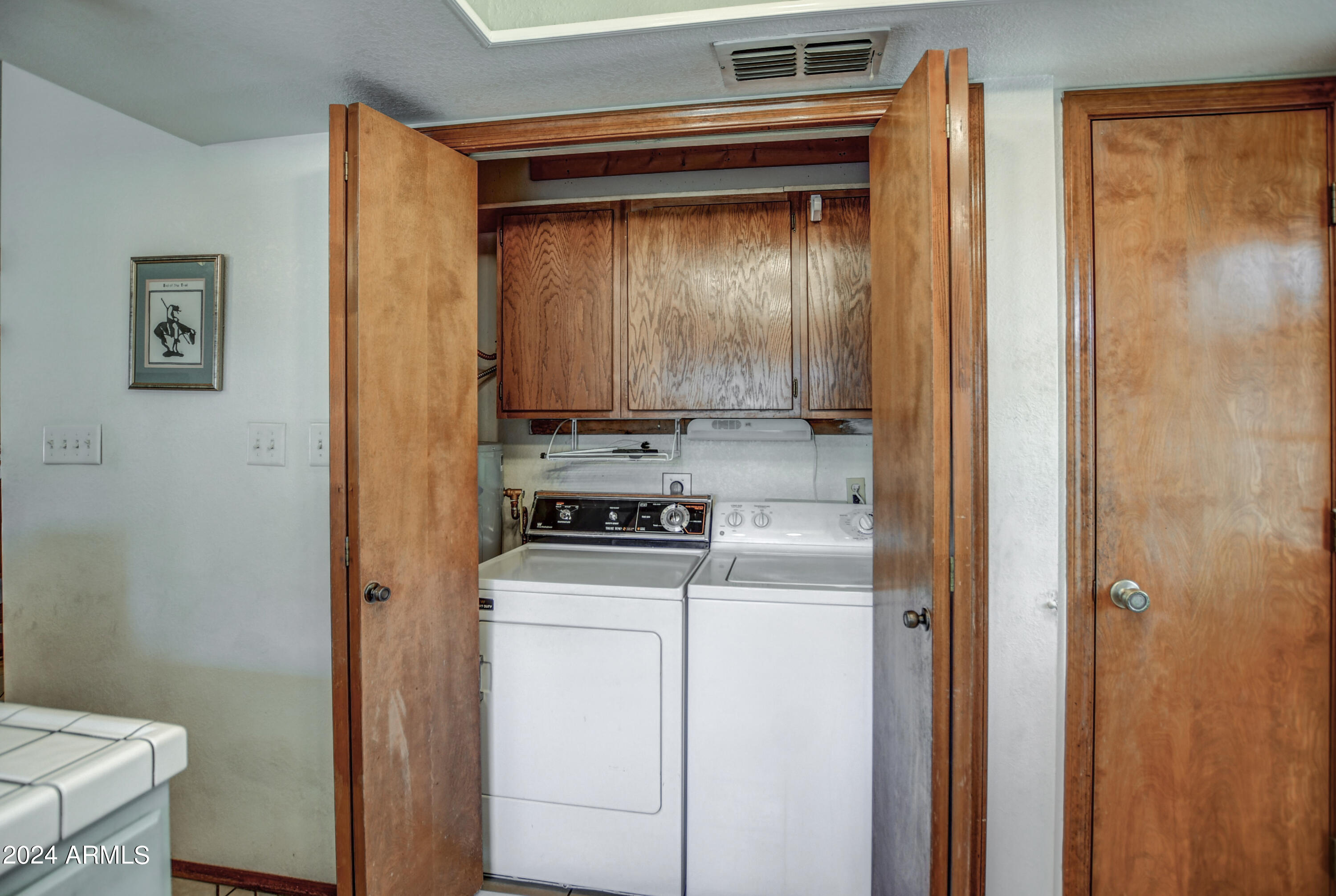 542 South Higley Road, Unit 111 Mesa, AZ 85206 - Photo 12 of 38 Laundry and pantry