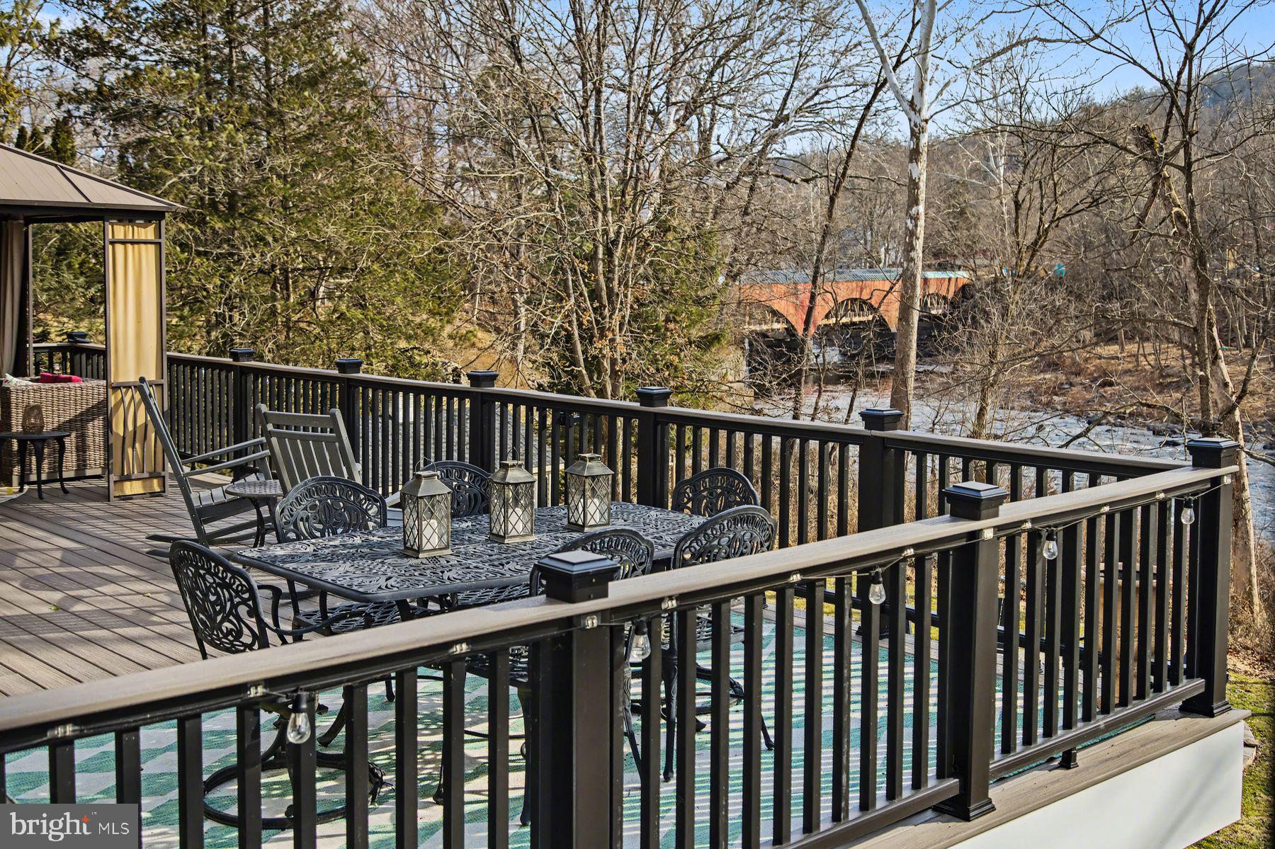 59 Byram Road Pipersville, PA 18947 - Photo 15 of 47 a view of a balcony with wooden floor and fence