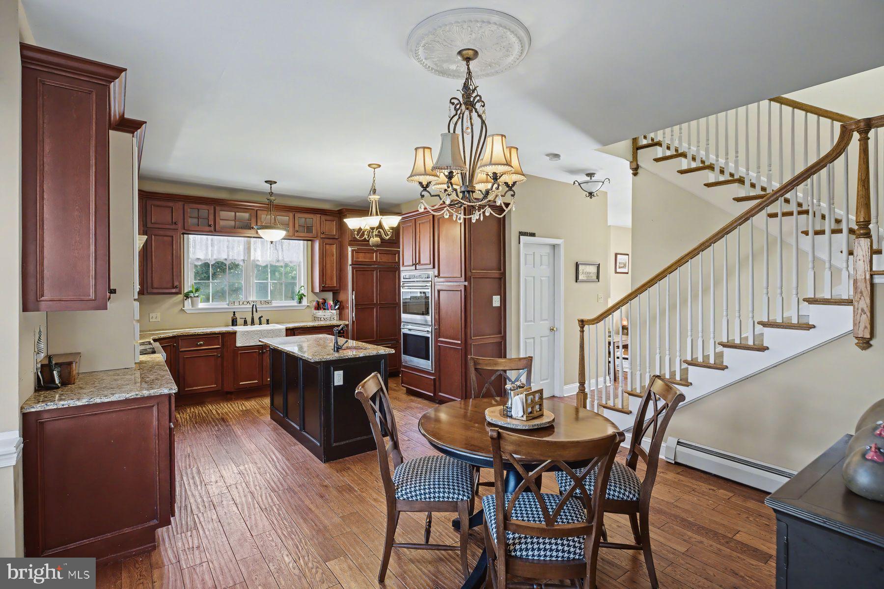 59 Byram Road Pipersville, PA 18947 - Photo 19 of 47 a view of a dining room with furniture window and wooden floor