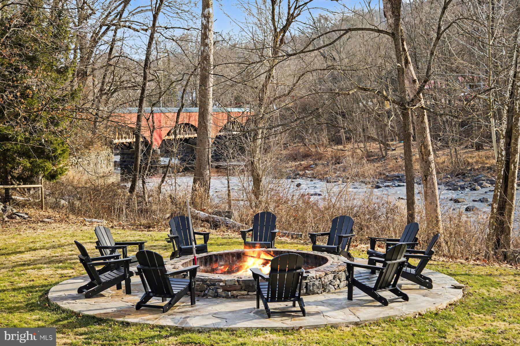 59 Byram Road Pipersville, PA 18947 - Photo 2 of 47 a backyard of a house with table and chairs
