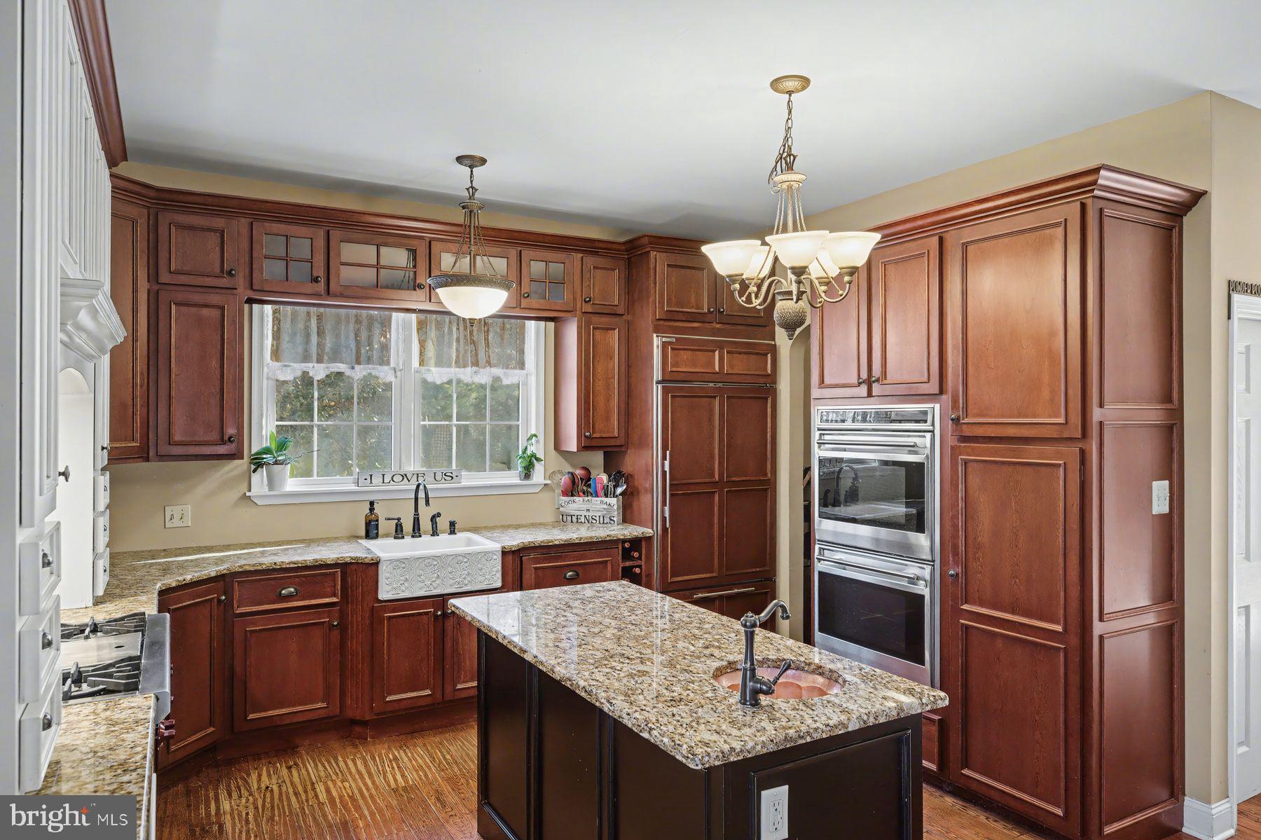 59 Byram Road Pipersville, PA 18947 - Photo 21 of 47 a kitchen with granite countertop a refrigerator and a sink