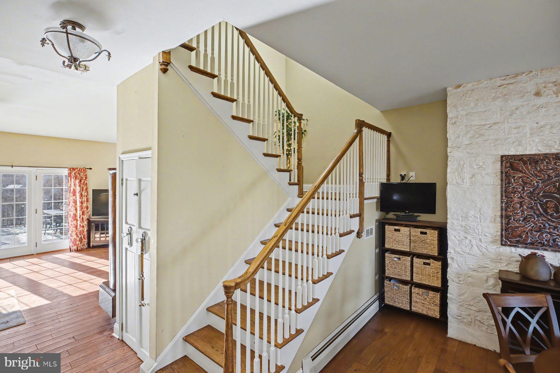 59 Byram Road Pipersville, PA 18947 - Photo 24 of 47 a view of entryway livingroom and hall with wooden floor