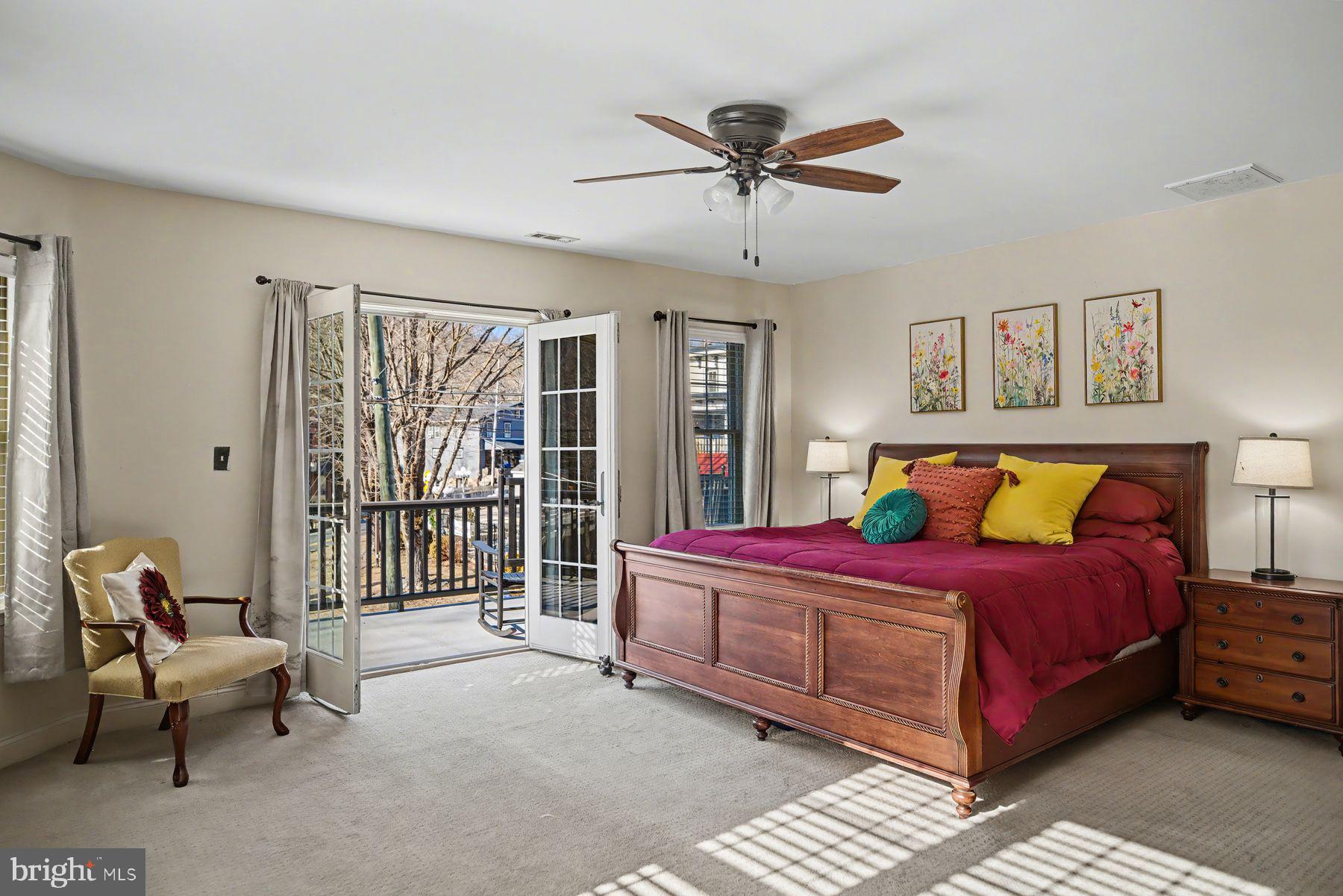 59 Byram Road Pipersville, PA 18947 - Photo 27 of 47 a bedroom with a bed and a chandelier