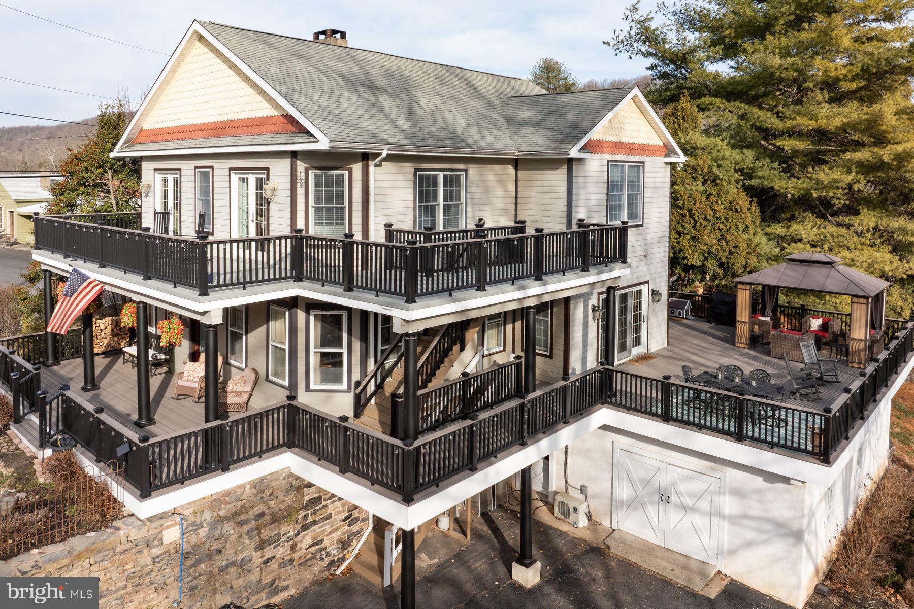 59 Byram Road Pipersville, PA 18947 - Photo 3 of 47 a view of a house with wooden deck and a yard