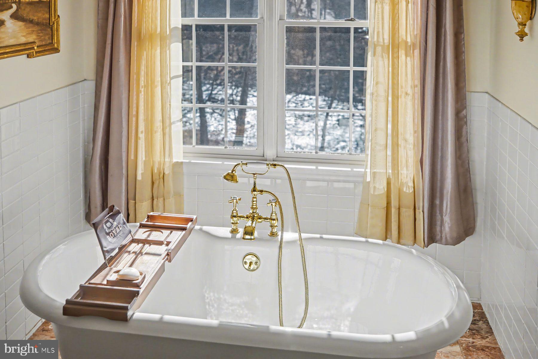 59 Byram Road Pipersville, PA 18947 - Photo 32 of 47 a bathroom with a granite countertop sink and a window