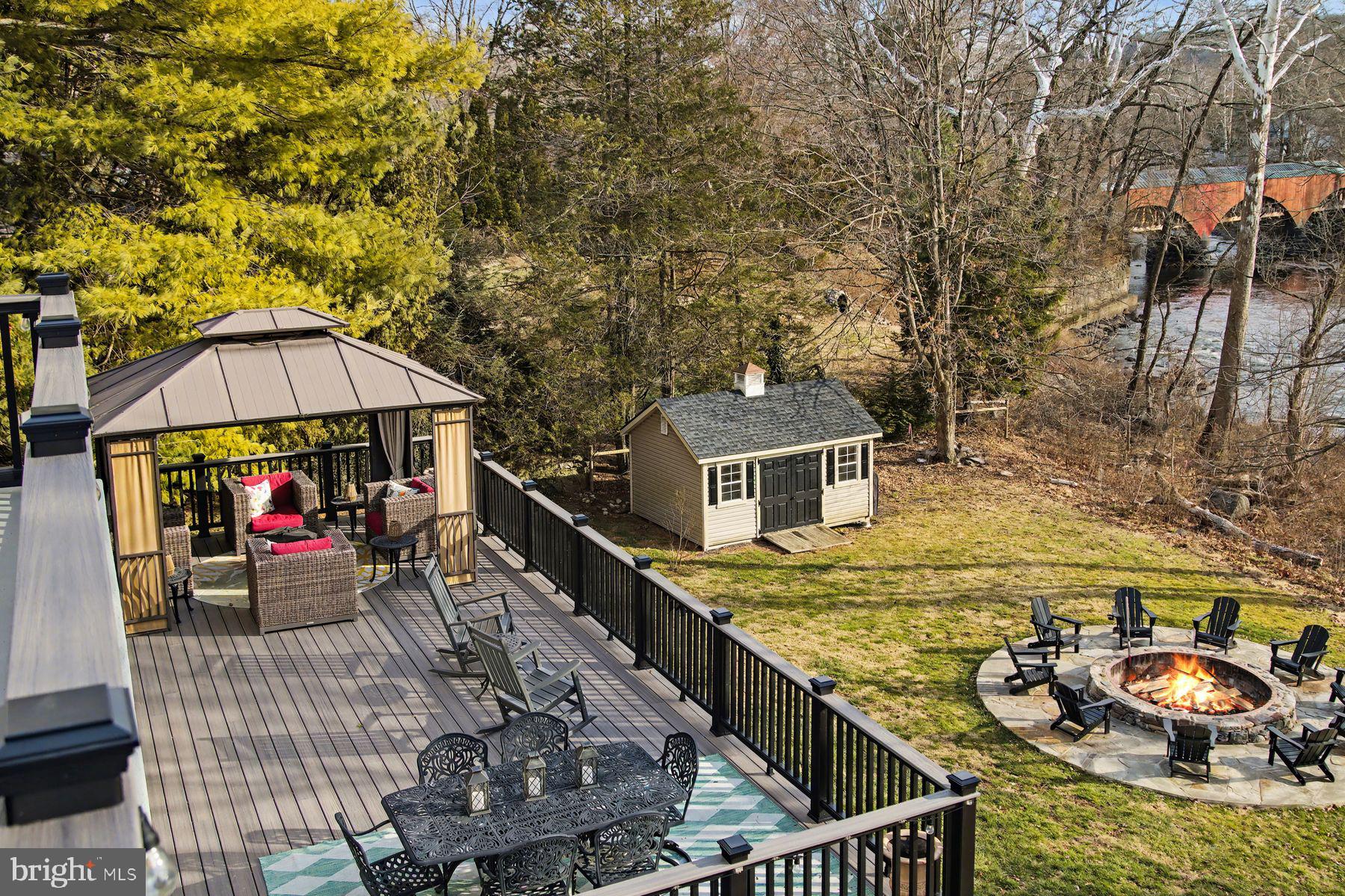59 Byram Road Pipersville, PA 18947 - Photo 4 of 47 an outdoor space with furniture and umbrella