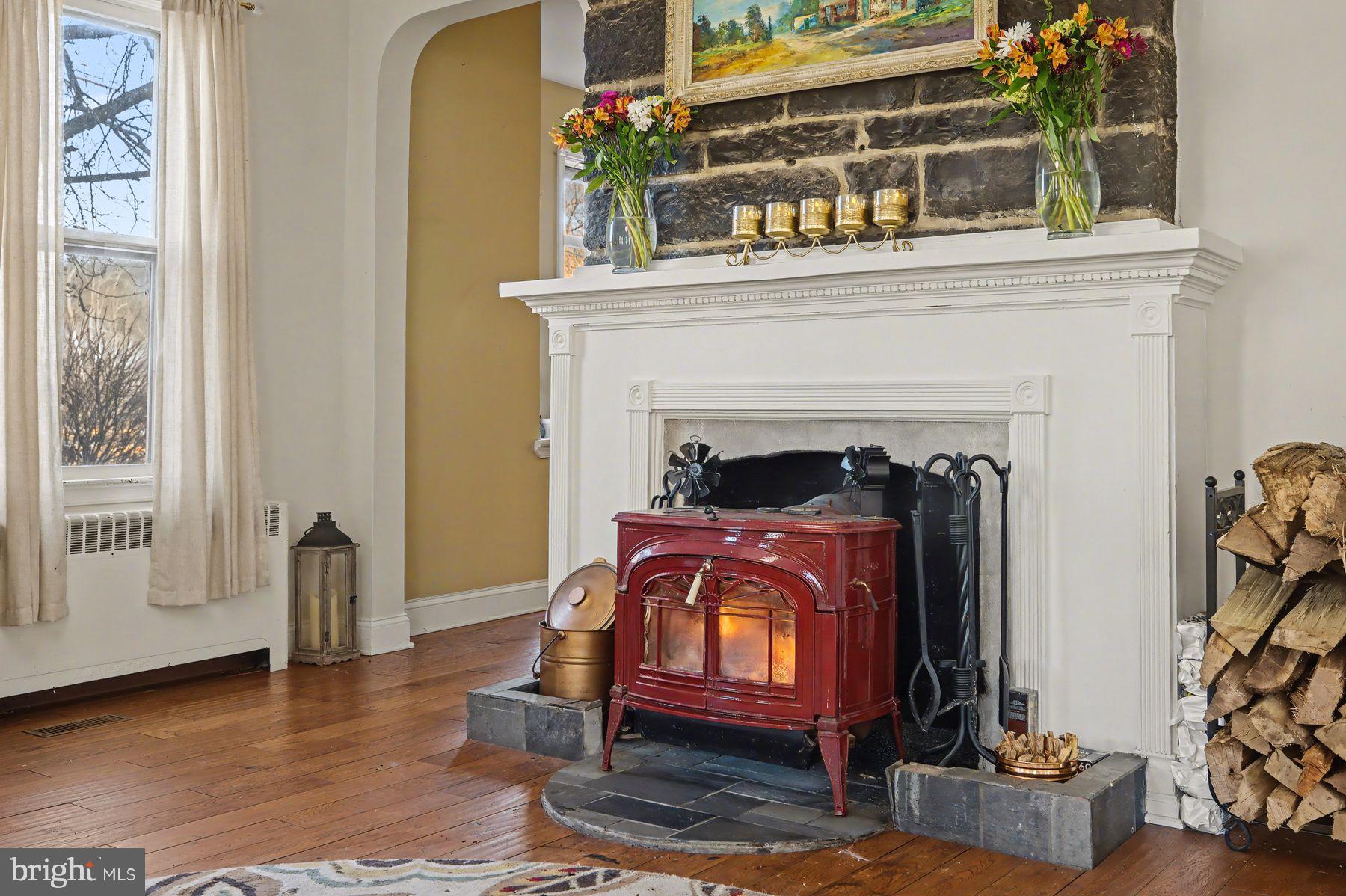 59 Byram Road Pipersville, PA 18947 - Photo 9 of 47 a living room with furniture and a fireplace