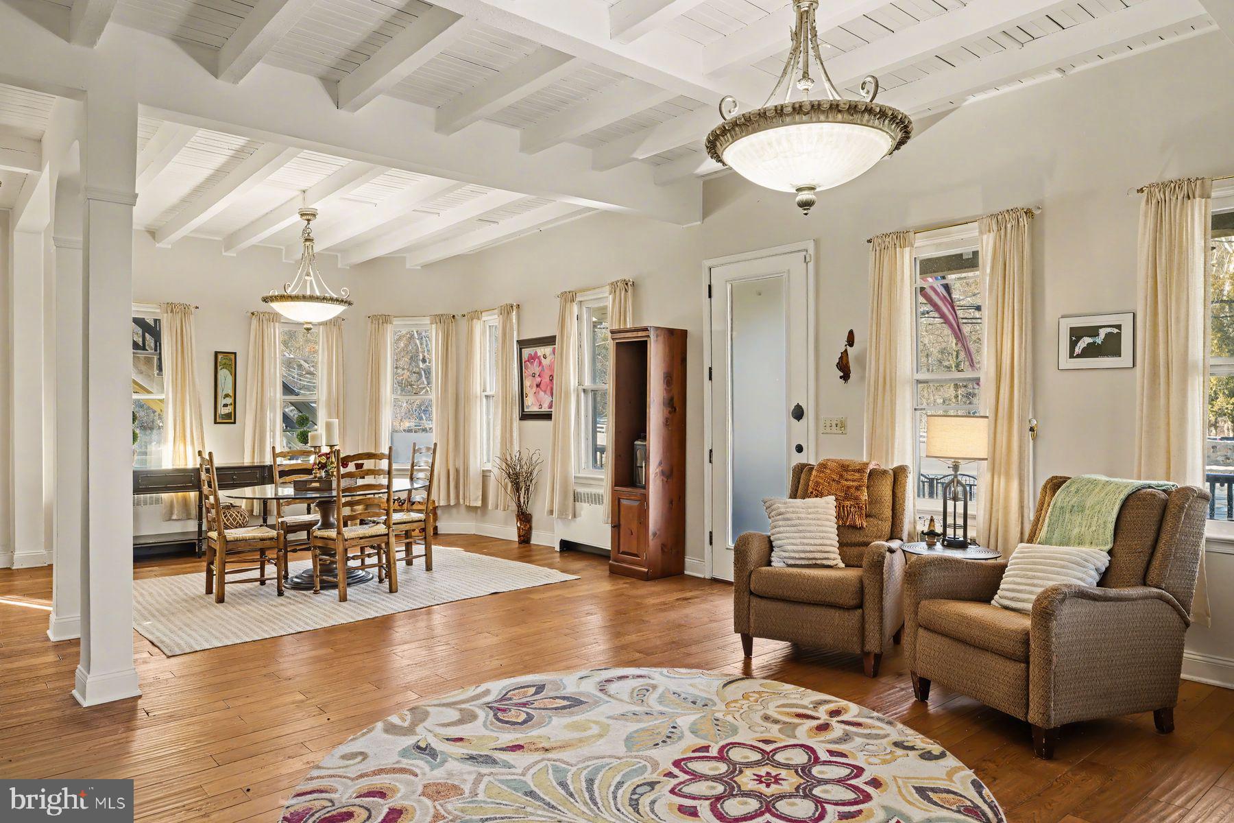 59 Byram Road Pipersville, PA 18947 - Photo 10 of 47 a living room with furniture wooden floor and a chandelier