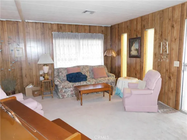 a room with furniture and a window