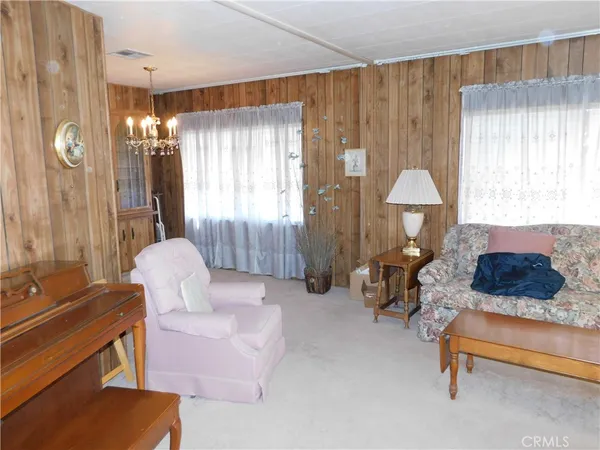 a bed room with a bed and a window