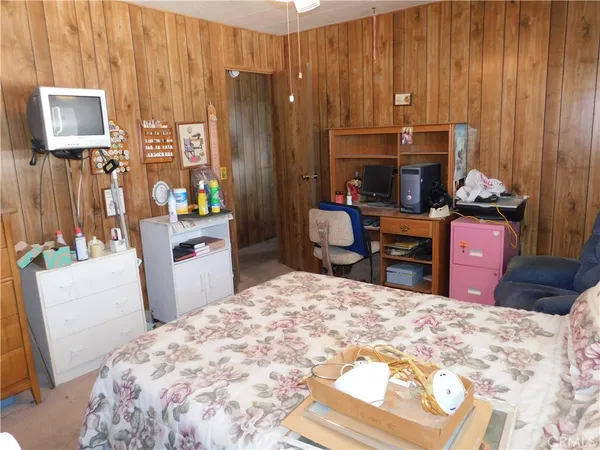 a kitchen with a sink and a refrigerator