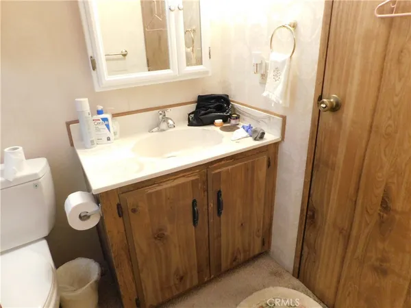 a view of a backyard with pathway