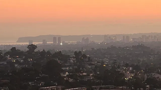 a view of city and mountain