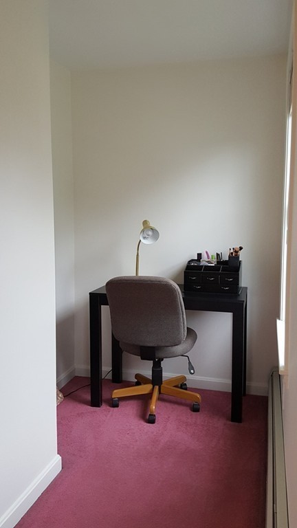 23 Calvin Street Ayer, MA 01432 - Photo 22 of 30 a view of a workspace with furniture and a window