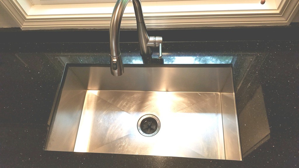 23 Calvin Street Ayer, MA 01432 - Photo 8 of 30 a view of water heater