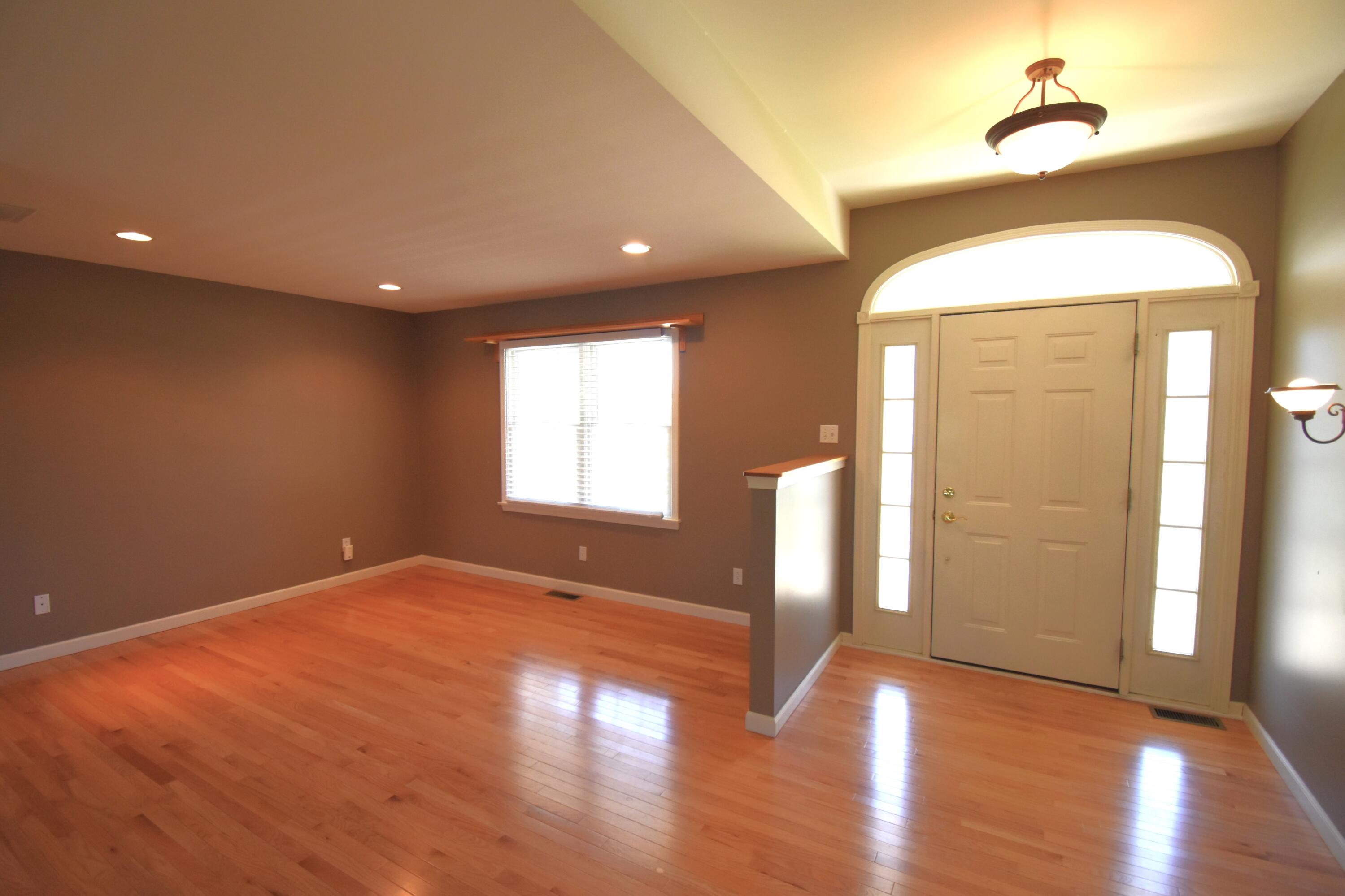 522 Pheasant Run Rensselaer, IN 47978 - Photo 17 of 55 a view of empty room with wooden floor and fan
