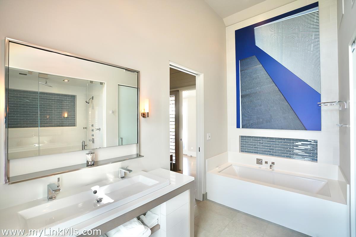 30 Crackatuxet Road Edgartown, MA 02539 - Photo 20 of 45 a bathroom with a bathtub and a sink