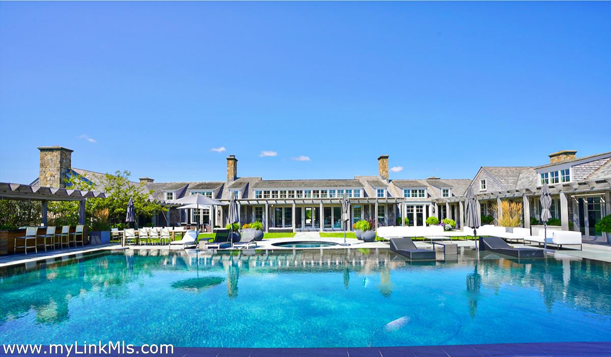30 Crackatuxet Road Edgartown, MA 02539 - Photo 2 of 45 a view of a lake with a house
