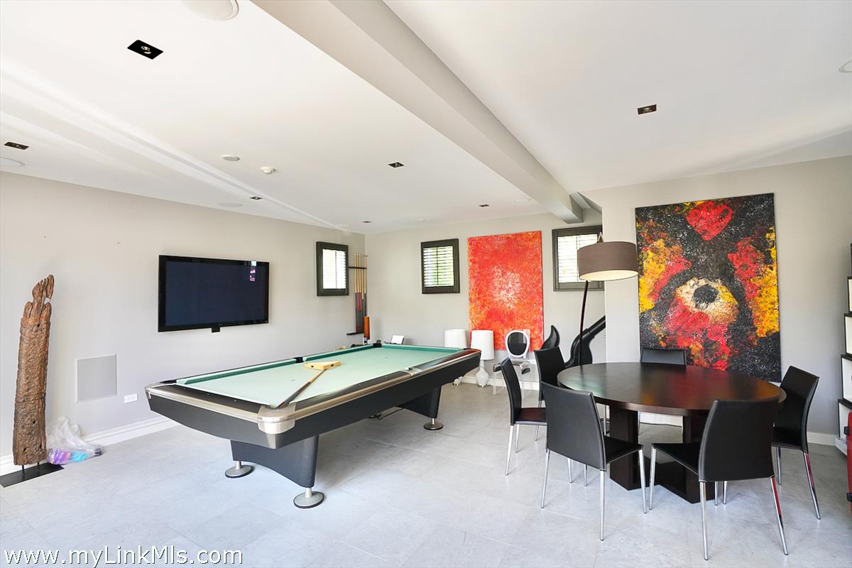 30 Crackatuxet Road Edgartown, MA 02539 - Photo 28 of 45 a living room with furniture and flat screen tv