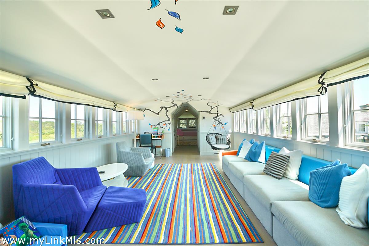 30 Crackatuxet Road Edgartown, MA 02539 - Photo 30 of 45 a living room with furniture and a rug