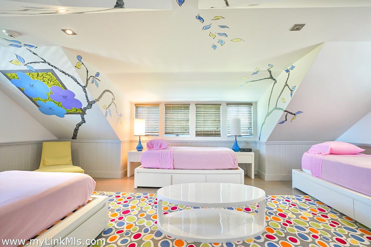 30 Crackatuxet Road Edgartown, MA 02539 - Photo 31 of 45 a bedroom with bed and window