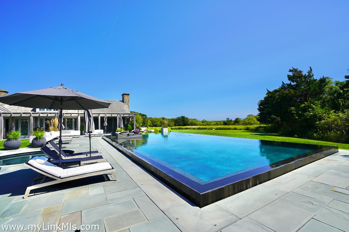 30 Crackatuxet Road Edgartown, MA 02539 - Photo 33 of 45 a view of swimming pool with chairs in patio