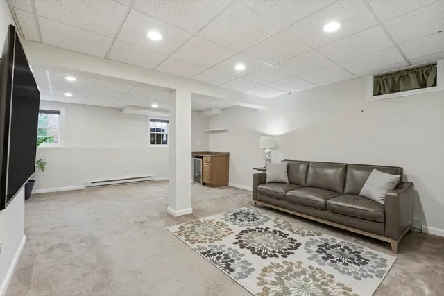 a view of a livingroom with a kitchen