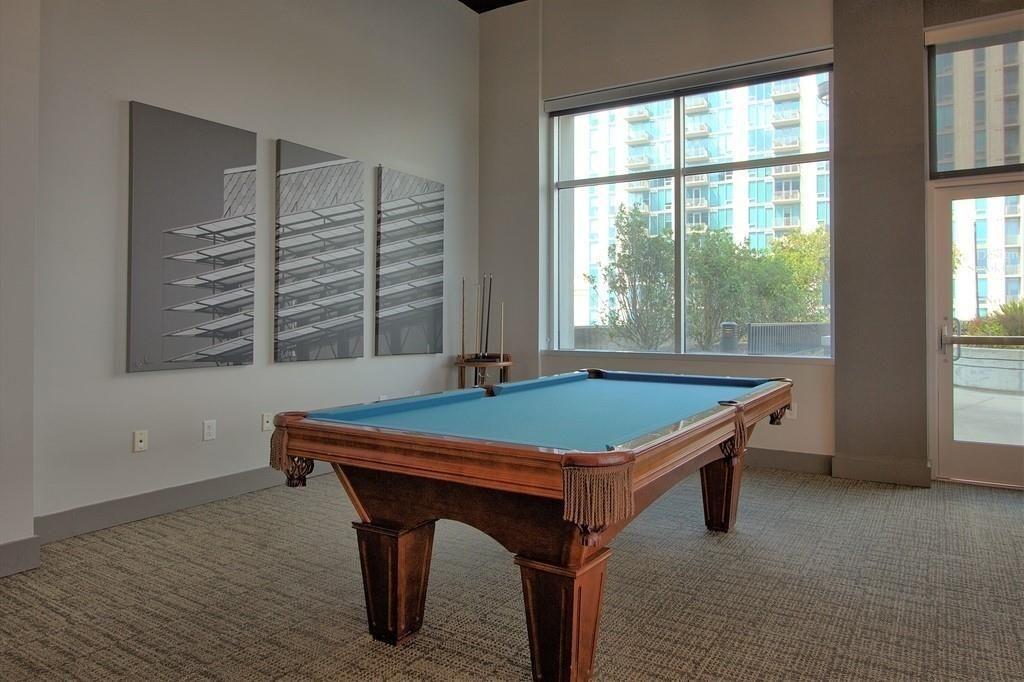 250 Pharr Road Northeast, Unit 601 Atlanta, GA 30305 - Photo 34 of 34 a room with pool table and windows