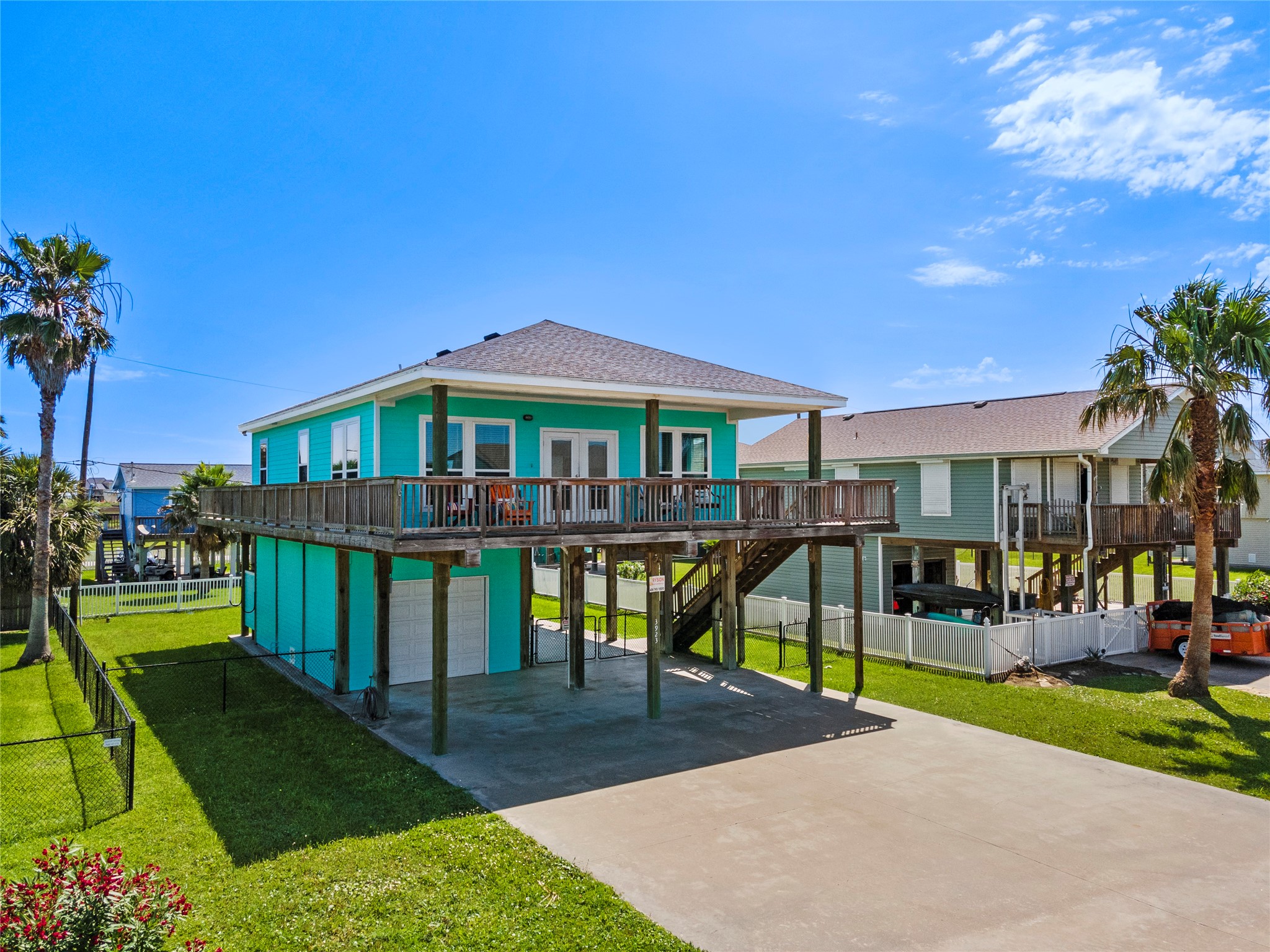 3923 Reeves Drive Galveston, TX 77554 - Photo 2 of 36 a view of a house with a yard