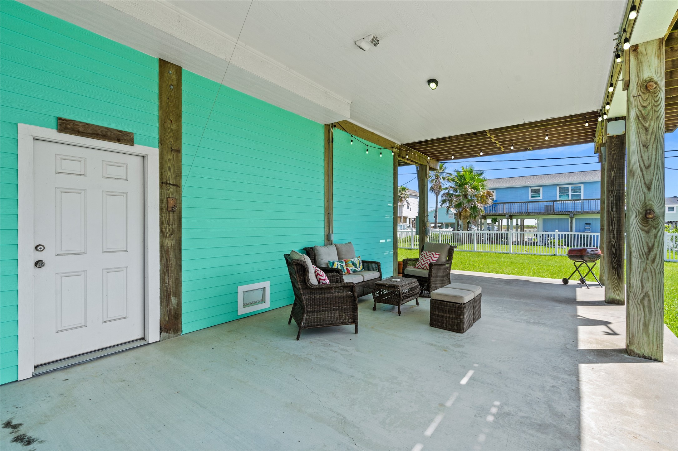 3923 Reeves Drive Galveston, TX 77554 - Photo 28 of 36 a swimming pool with outdoor seating and yard