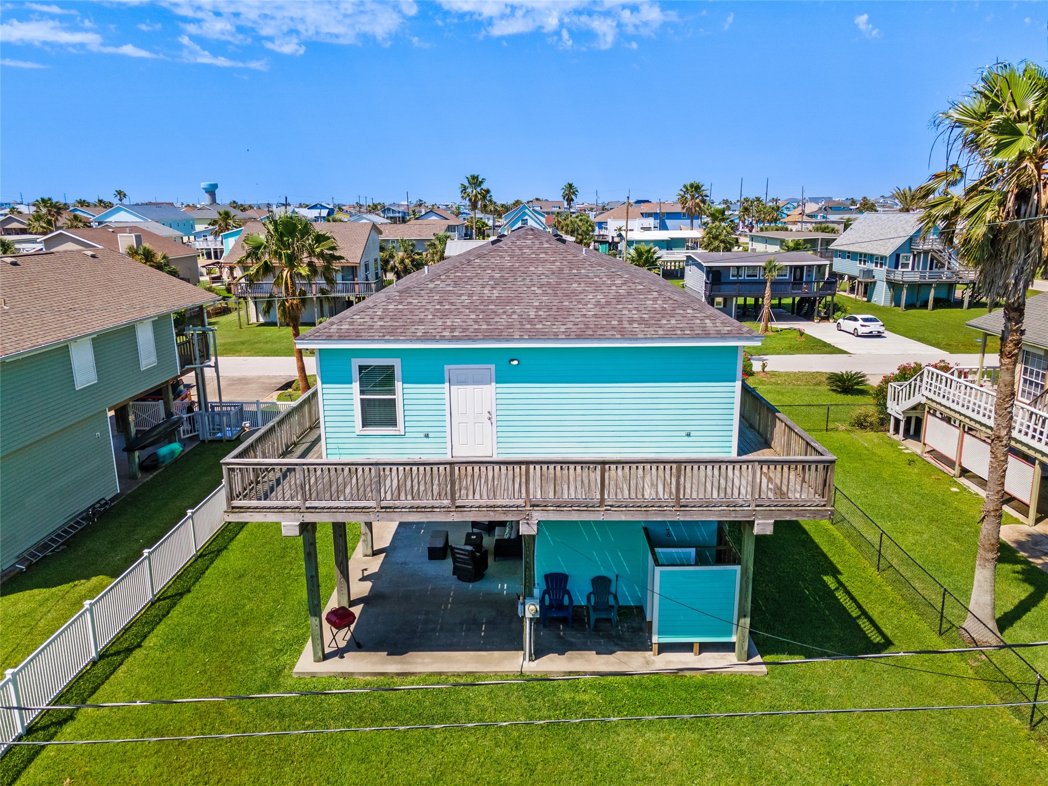 3923 Reeves Drive Galveston, TX 77554 - Photo 4 of 36 an aerial view of a house with swimming pool garden and outdoor seating