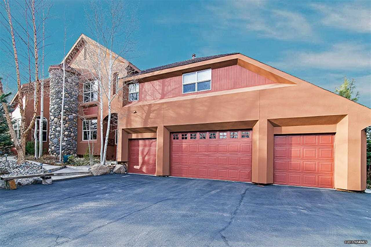 a view of a house with garage