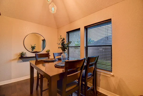 a table and chairs in a room