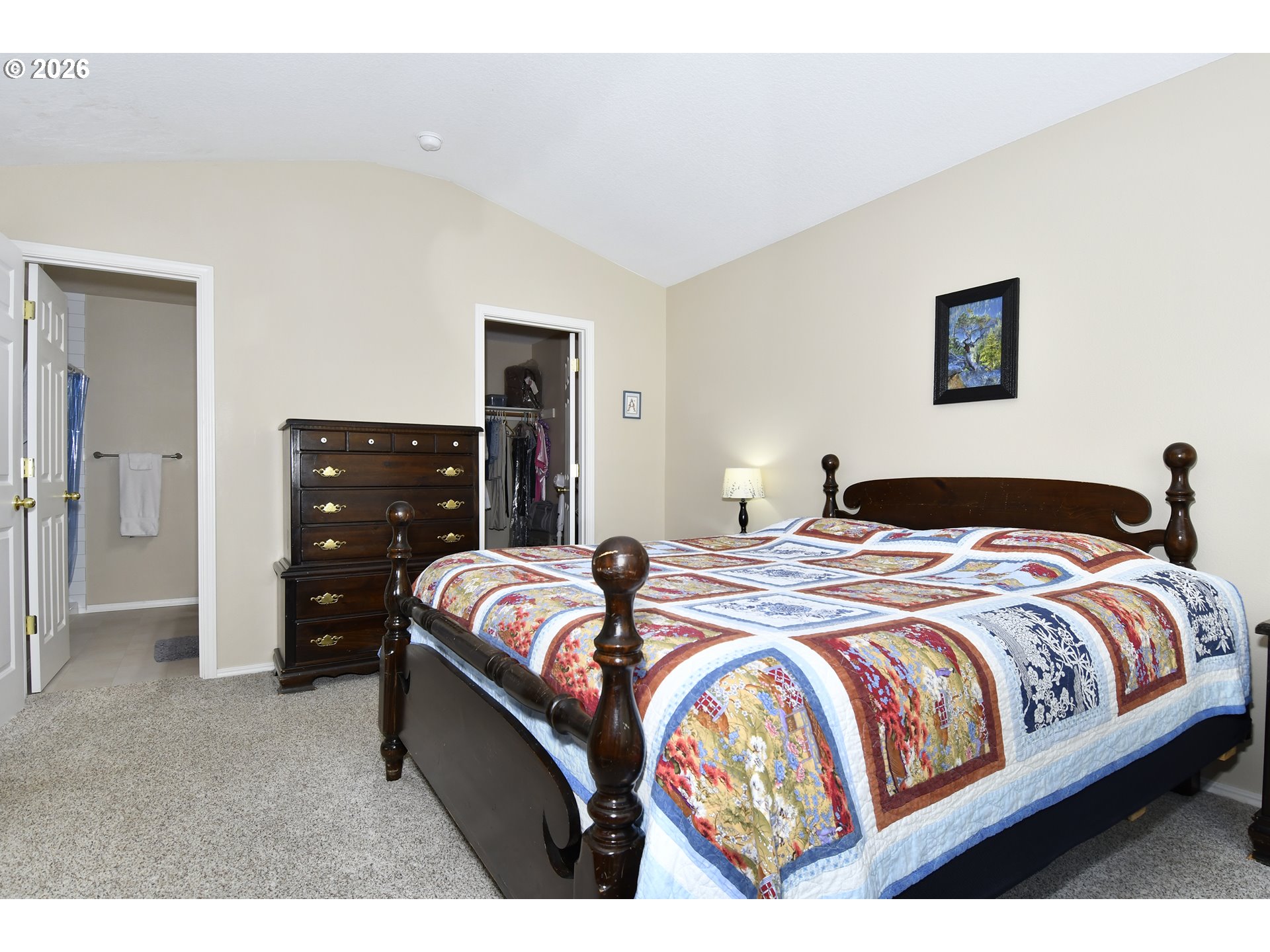 38029 Marcella Court Sandy, OR 97055 - Photo 14 of 29 a bedroom with a bed and dresser