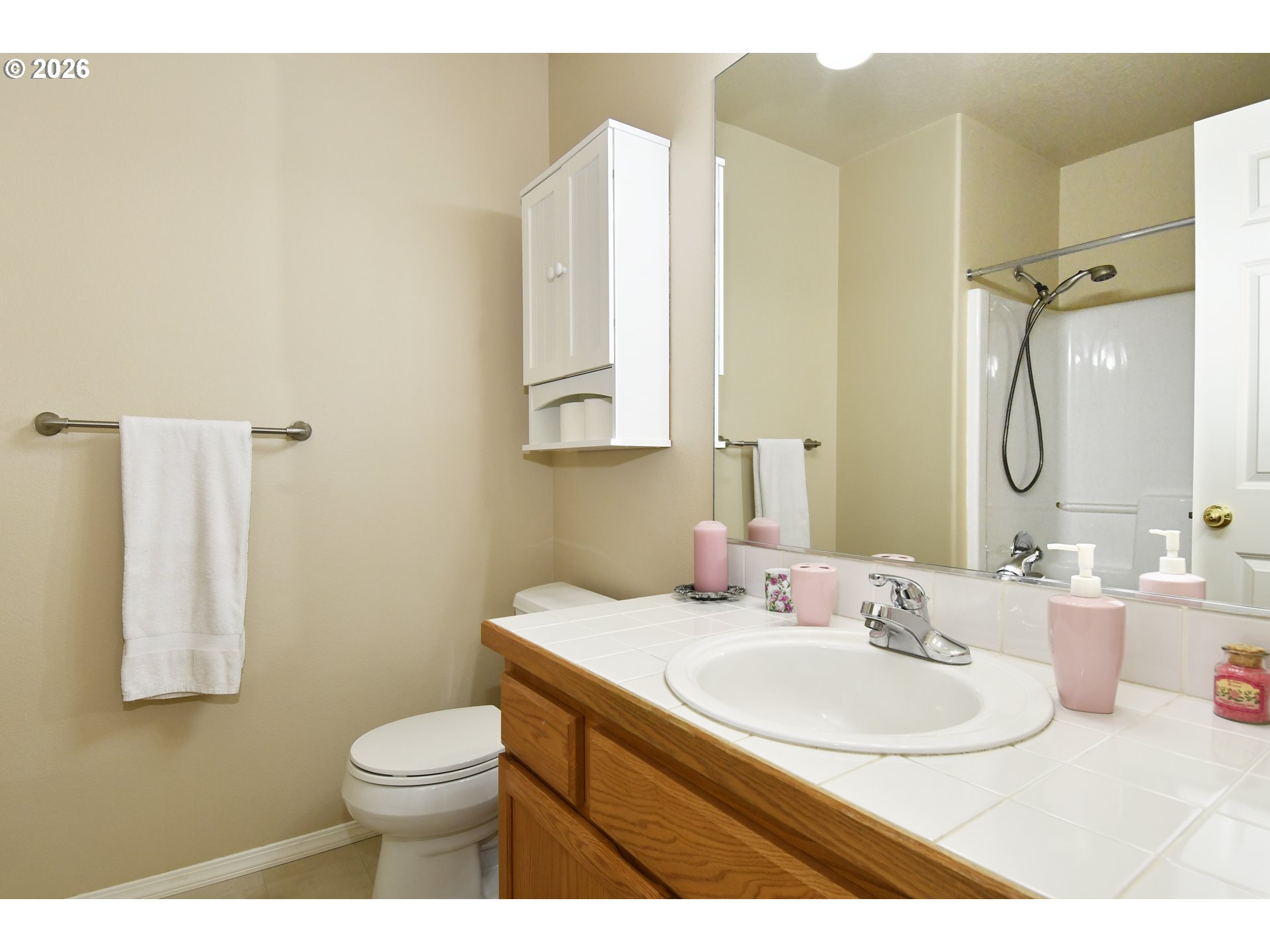 38029 Marcella Court Sandy, OR 97055 - Photo 20 of 29 a bathroom with a sink and a mirror