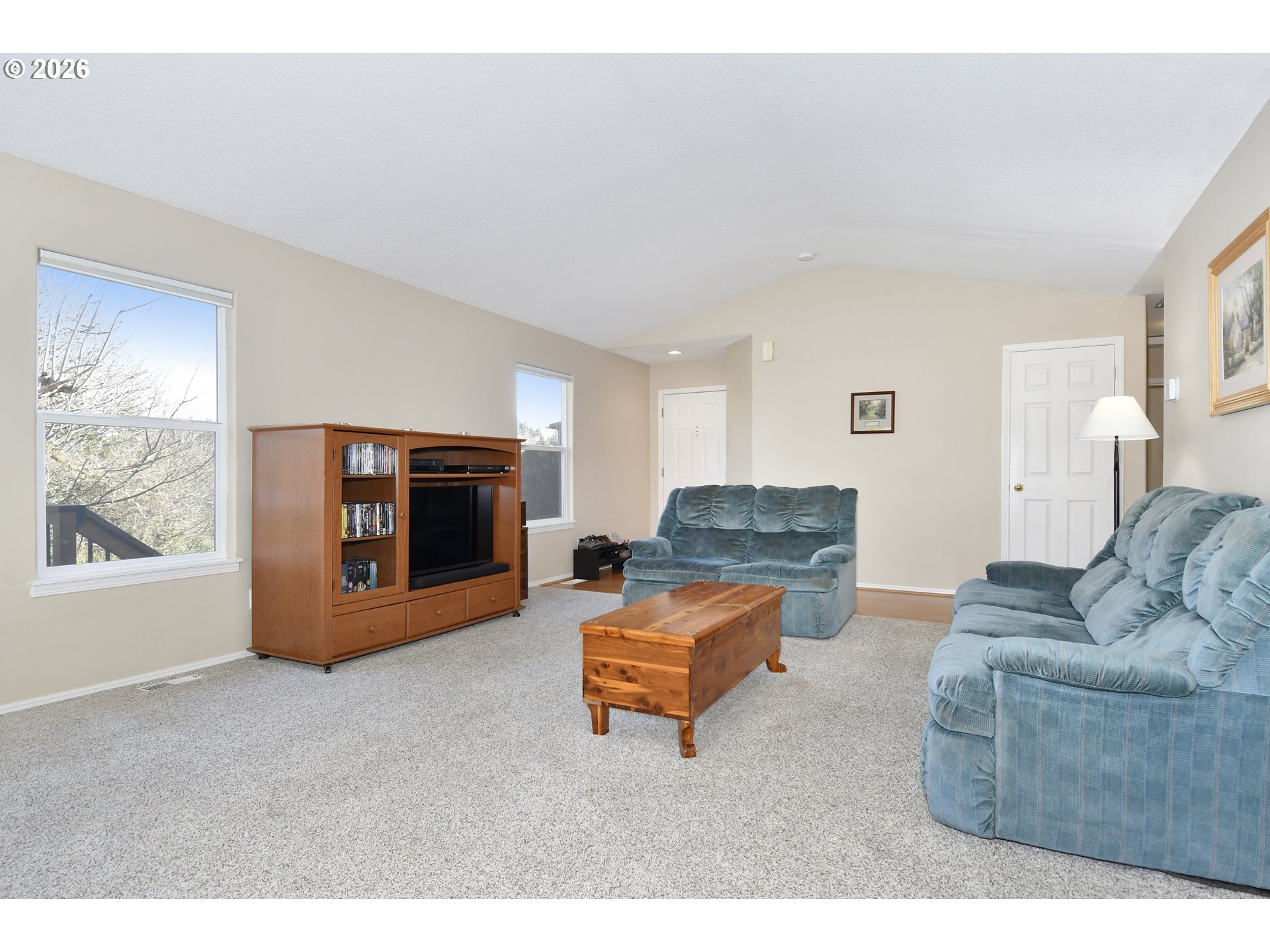 38029 Marcella Court Sandy, OR 97055 - Photo 5 of 29 a living room with furniture and a fireplace