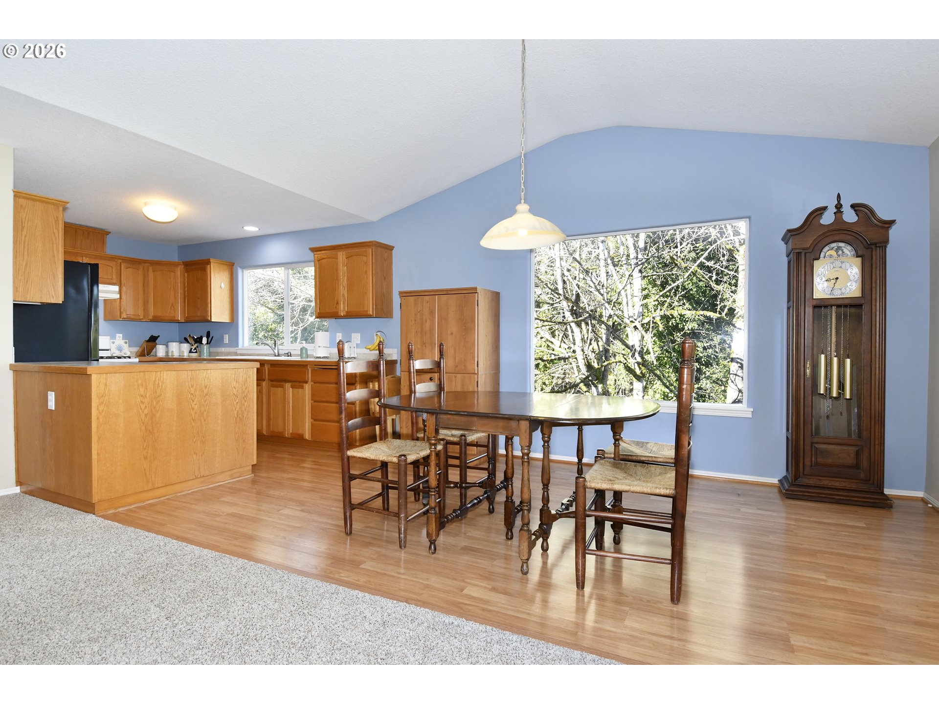 38029 Marcella Court Sandy, OR 97055 - Photo 7 of 29 a dining room with furniture and wooden floor