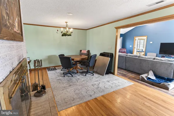 a spacious bathroom with a sink mirror and shower