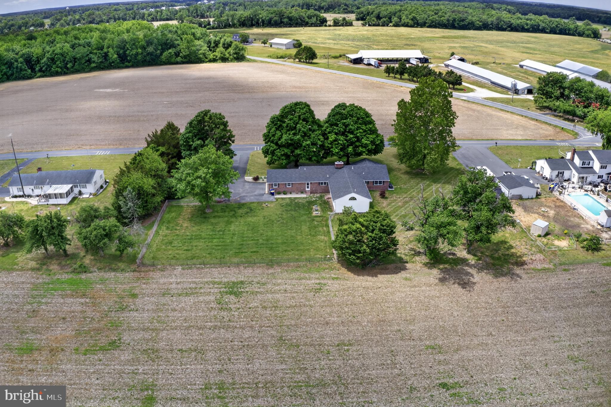 30077 Fire Tower Road Laurel, DE 19956 - Photo 81 of 87 an aerial view of a house with a yard and lake view