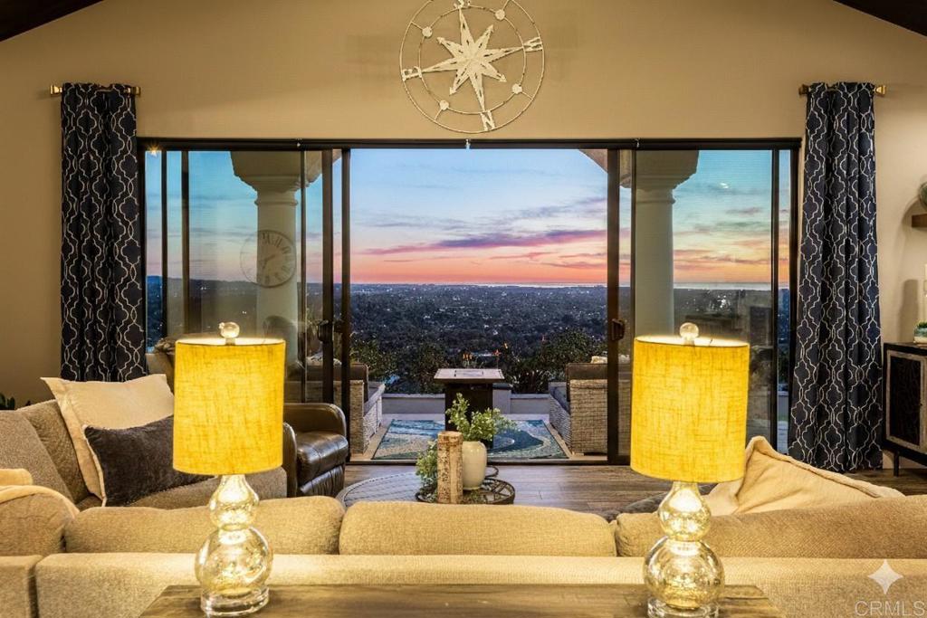 1966 Las Lomas Vista, CA 92084 - Photo 12 of 48 a living room with furniture and a large window