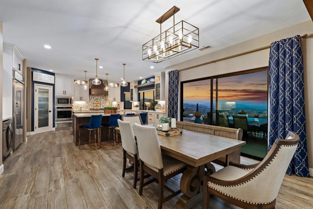 1966 Las Lomas Vista, CA 92084 - Photo 25 of 48 a view of a dining room with furniture window and outside view